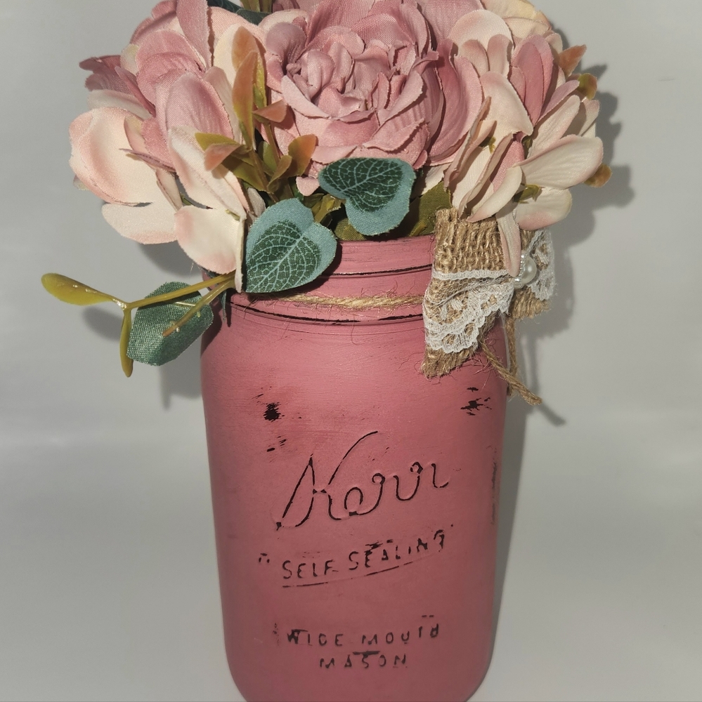 Vintage distressed painted dusty rose quart mason jar with flower bouquet